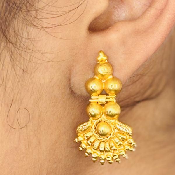 Gold plated jhumka earring resembling temple jewellery for women
